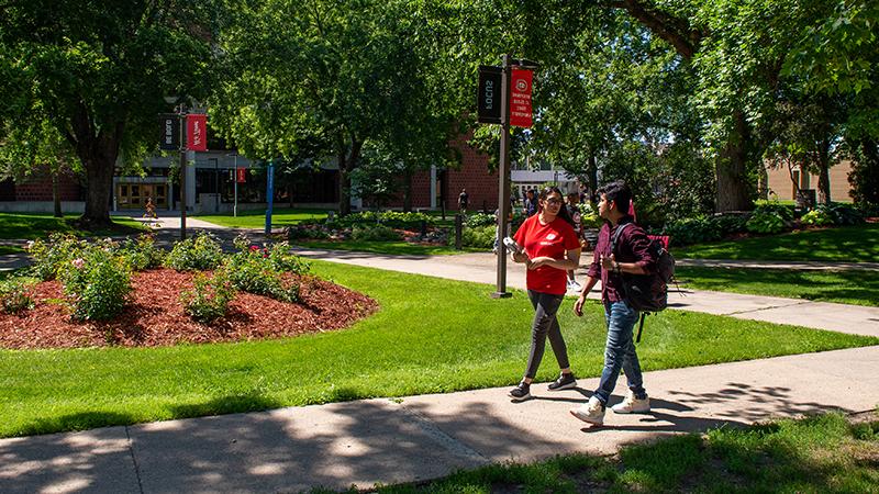 Students walking toward Administrative Services